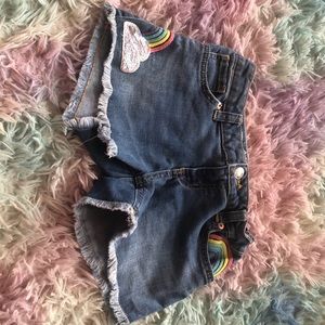 Navy jeans with rainbow things on the side 13 times and that’s it.